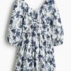 H & M - Katoenen jurk met uitlopende rok - Wit/Bloemen