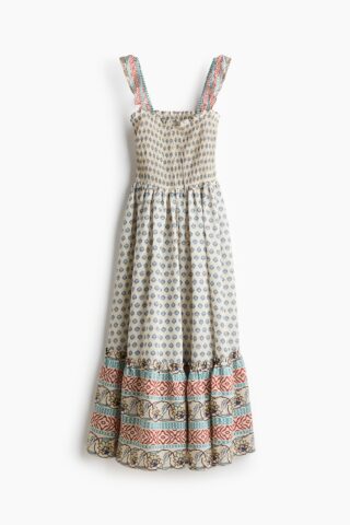 H & M - Uitlopende jurk met smokwerk - Lichtbeige/Dessin