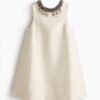 H & M - A-linejurk met decoraties - Roomwit