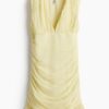 H & M - Gedrapeerde jurk van chiffon - Lichtgeel