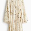 H & M - Oversized jurk met strikceintuur - Lichtbeige/Bloemen