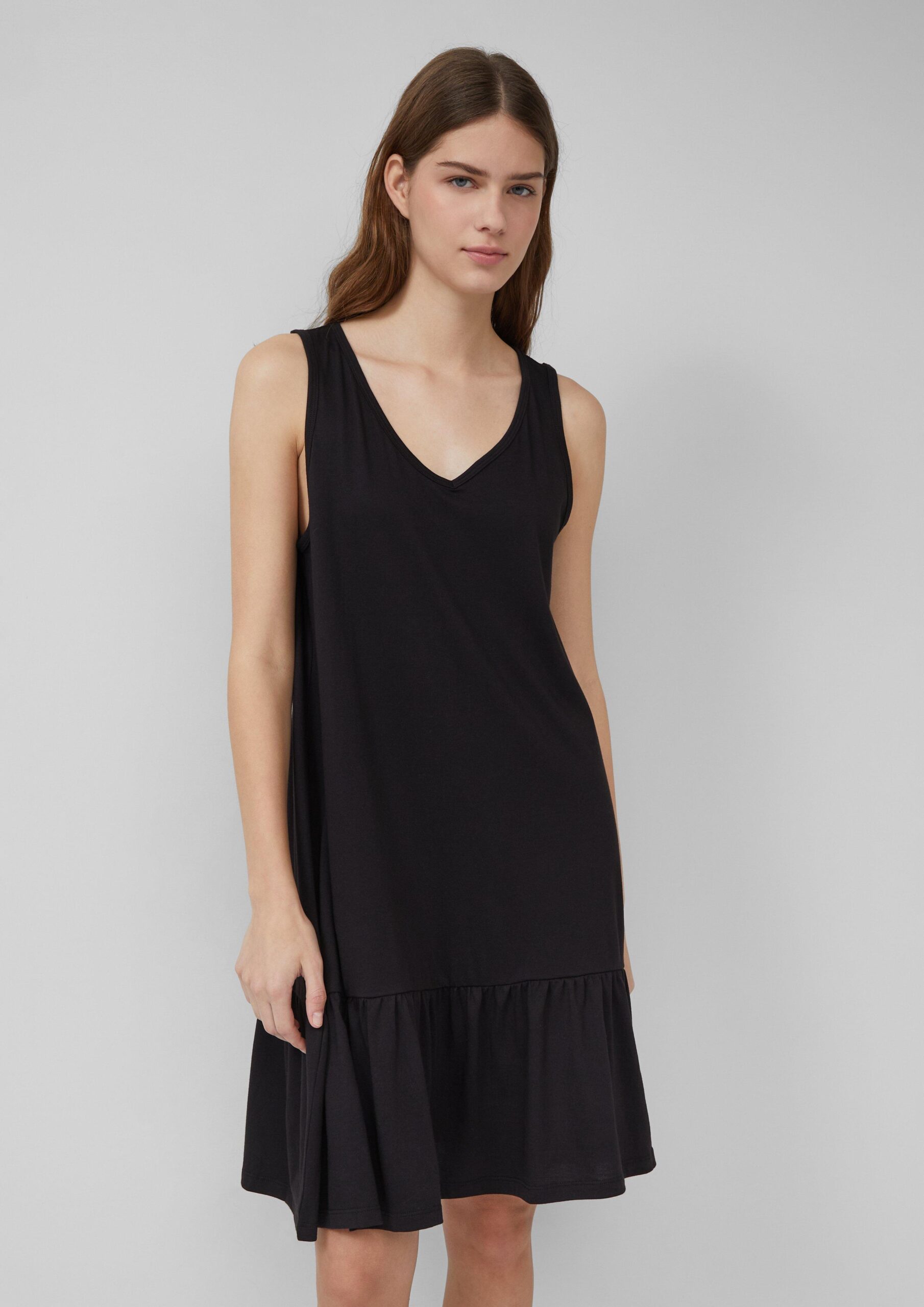 Korte jersey jurk met strikdetail op de rug