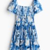 H & M - Crinklejurk met smokwerk - Wit/Blauwe Bloemen