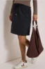 Knielange rok met tapedetails